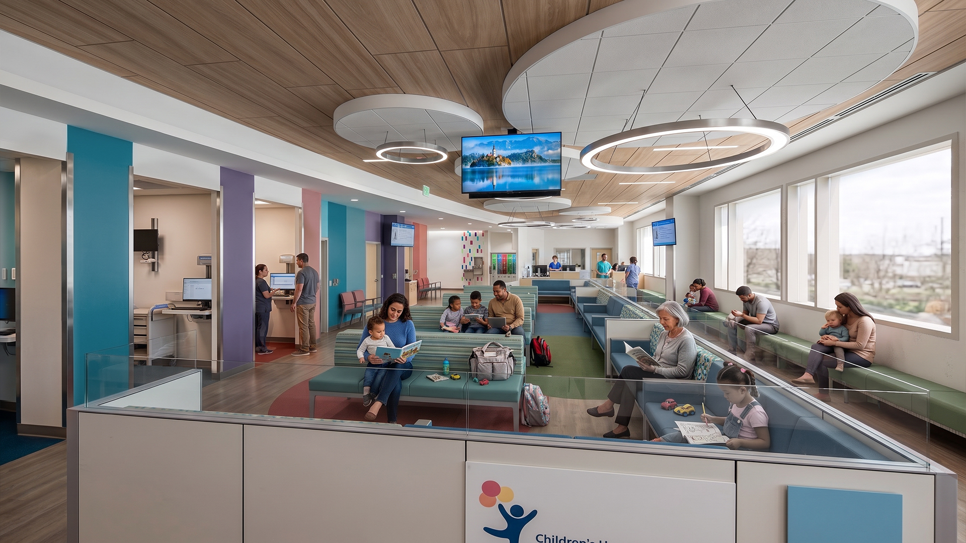 The entrance to the Anschutz Emergency Department with parents and children waiting and staff assisting