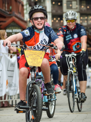 Chase and his mom, Laura, crossing the finish line.