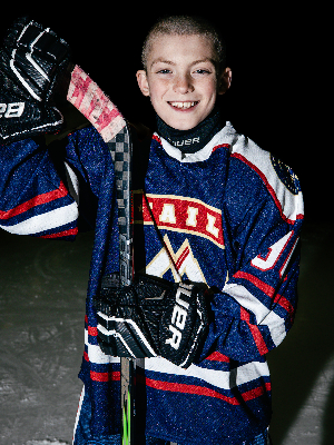 Owen with his Mountaineers hockey Team uniform