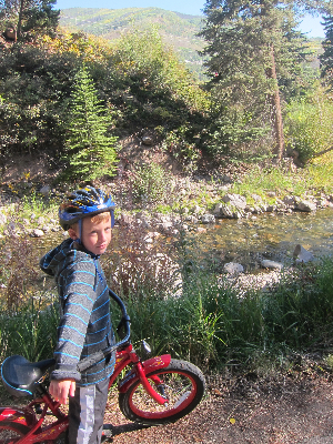 Theo biking on trails when he was little