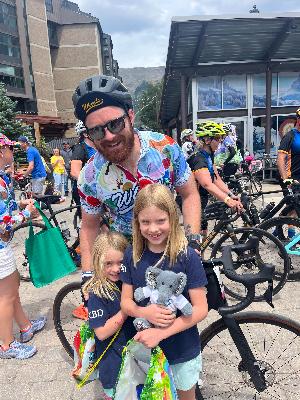 My girls meeting me at the finish line- smile behind the pain!