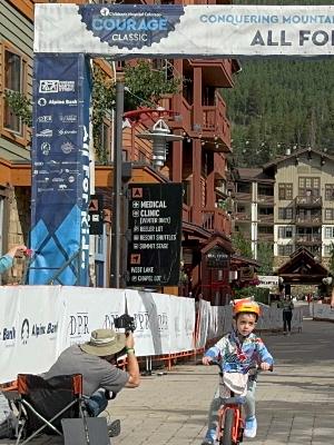 Jaren crossing the finish line 2025