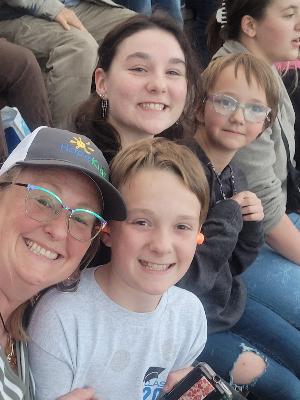 Nikki with Sara, Levi and Nonnie at Red Rocks for a concert.
